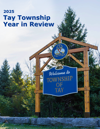 Cover photo of Year in Review photo of Welcome to Tay Township sign